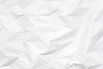 Obraz premium White crumpled paper texture background.