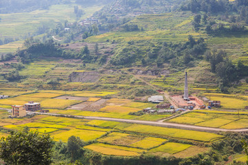 Brick factory with chimney in the Village