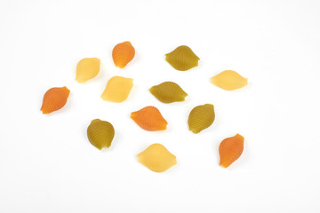 Colored pasta isolated on white background. Top view