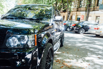 Premium SUV headlights in black with reflection