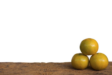 fresh orange put on an old wood table  isolated on white background.