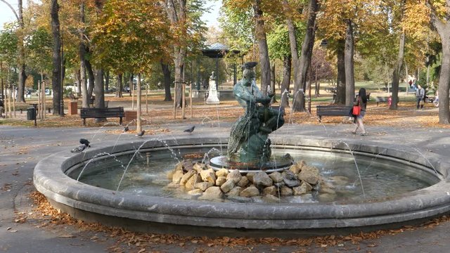 Fountain The Struggle (Borba) or The man with the snake or Fisherman Fountain on Belgrade Kalemegdan Fortress. The bronze sculpture made by sculptor Simeon Roksandic. Belgrade 21 October 2017
