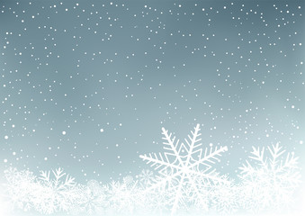 Fototapeta na wymiar Winter sky background with snow. Frosty close-up wintry snowflakes. Ice shape pattern. Christmas holiday decoration backdrop