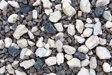 Small stones lie on the ground.