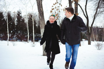 Couple in love at winter park.