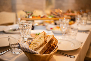 Homemade bread sliced and grilled on the table. Close up