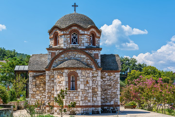 Olympiada, Greece - August 18, 2018: St. Nicholas church at the beach of the town Olympiada in Chalkidiki in Greece