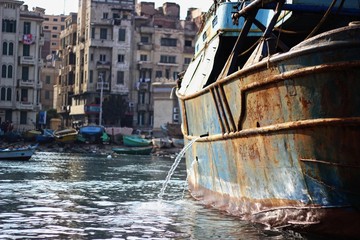 an old boat in the shores of alexandria egypt 