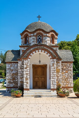 Naklejka premium Olympiada, Greece - August 18, 2018: St. Nicholas church at the beach of the town Olympiada in Chalkidiki in Greece