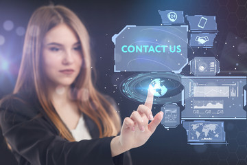 The concept of business, technology, the Internet and the network. A young entrepreneur working on a virtual screen of the future and sees the inscription: Contact us