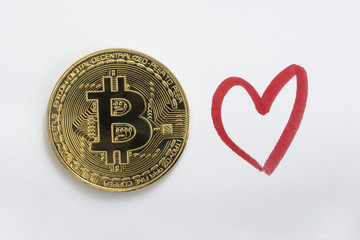 Bitcoin BTC Cryptocurrency Coin and a Red Heart