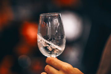White wine glass - Front view in wine market - close up tasting 