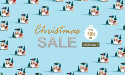 Christmas sale message with little car carrying Christmas trees