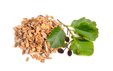Alder wood chips with plant isolated on white background