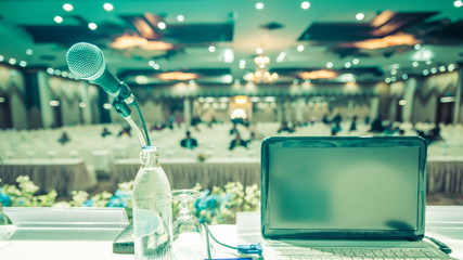 Laptop and microphone defocus in meeting room, Seminar blur background in hall.