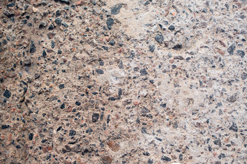 Unusual stylish texture of stones of various colors and sizes