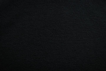 Black rough fabric texture background.