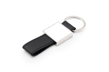 Blank leather key chain on isolated background with clipping path.