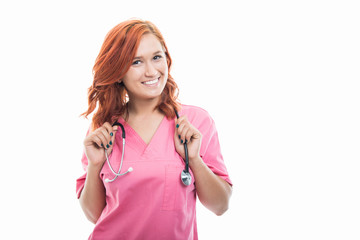 Young female doctor holding stethoscope around his neck