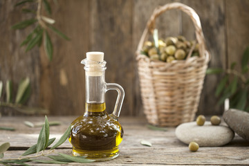 olive oil bottle over wooden table 