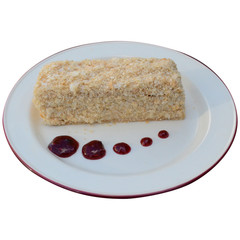 piece of cake on a plate isolated on white