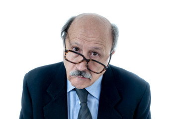 Portrait of exhausted senior man with sad and worried expression overworked and tired