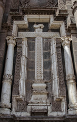Close up of a cross in front a catholic church