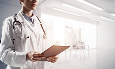 Modern medical industry presented by means of female doctor