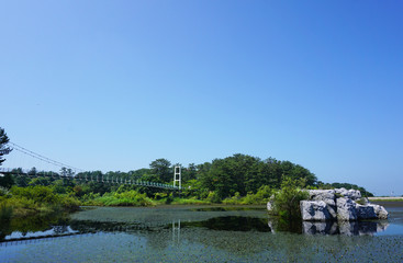 A bridge over ashinoko lake in Aomori  , Japan