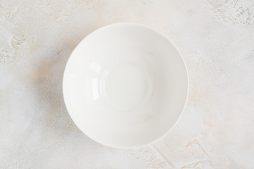 Empty round white bowl, top view