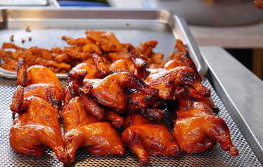 roasted chickens on plate