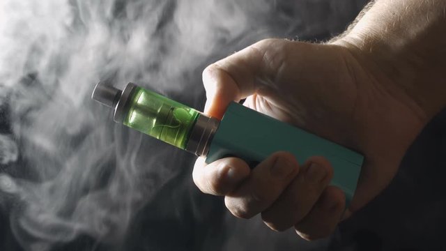 electronic cigarette over a dark background