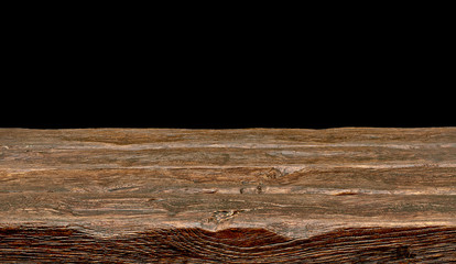 Empty wooden table edge on black background