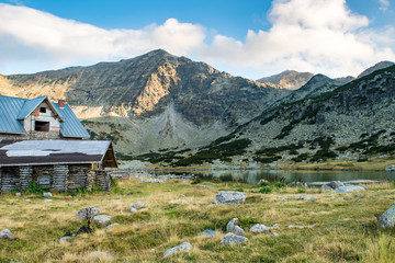 Fototapeta na wymiar Panoramic view of Musala mountain with a lake and a hut under
