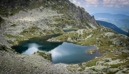 Fototapeta na wymiar Reflecting Lake under Malyovitsa peak, Rila Mountain park, Bulgaria