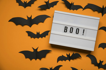 Boo! halloween lightbox message with black scary bats