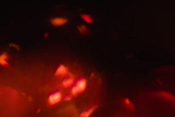 abstract lens flare background. defocused bokeh lights. blur christmas wallpaper decor.