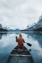 Girl Canoeing on a lake