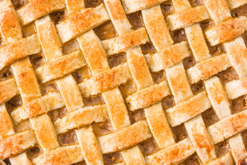 Homemade apple pie background. Close up
