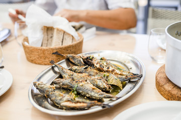 Silver tray full of delicious fish mackerel known as carapau in Portugal