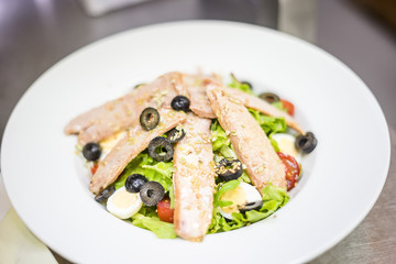 Delicious tuna salad served on white plate