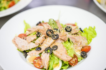 Delicious tuna salad served on white plate