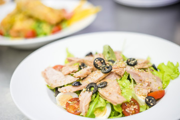 Delicious tuna salad served on white plate