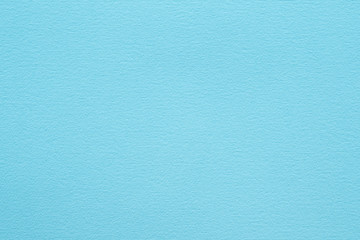 blue paper texture background. colored cardboard fibers and grain. empty space concept.