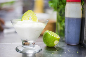 Lime mousse with slice of lime on the top
