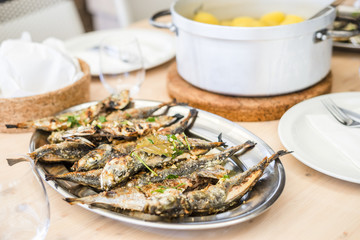 Silver tray full of delicious fish mackerel known as carapau in Portugal