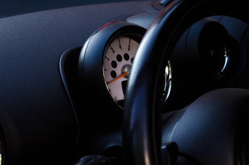 Car steering wheel and tachometer