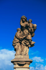 Czech, Prague, gothic sculpture of the Saint Anne on the Charles bridge. Prague, medieval art, statue on the bridge of King Charles.