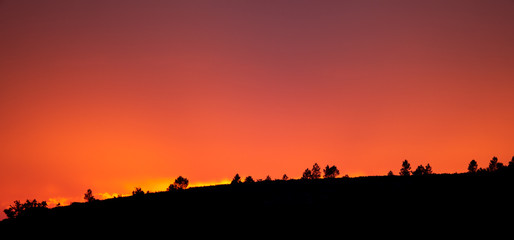 Fototapeta premium Sunset after the mountains high contrast profile
