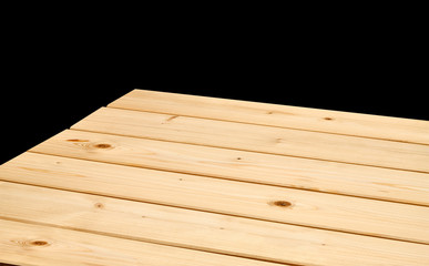 Perspective view of empty wooden table on black background including clipping path
